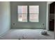 Bright room featuring two windows and neutral walls at 39 Atherton Circle, Angier, NC 27501