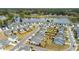 Scenic aerial view of a well-planned community with a serene lake and lush greenery at 4102 Catfish Way, Durham, NC 27703