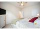 Cozy bedroom with a ceiling fan, neutral walls, and carpet flooring, creating a warm and inviting atmosphere at 4102 Catfish Way, Durham, NC 27703