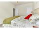 Bright bedroom featuring a cozy bed with natural light streaming through the window at 4102 Catfish Way, Durham, NC 27703