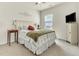 Charming bedroom with a comfortable bed, side tables, and natural light at 4102 Catfish Way, Durham, NC 27703