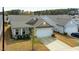 Well-maintained single-Gathering home with a two-car garage and manicured landscaping at 4102 Catfish Way, Durham, NC 27703