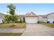 Charming single-story home with a well-manicured lawn, neutral siding, and an attached two-car garage in a desirable community at 4102 Catfish Way, Durham, NC 27703