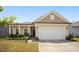 Inviting single-Gathering home with a two-car garage, well-kept lawn, and attractive landscaping that welcomes you home at 4102 Catfish Way, Durham, NC 27703