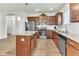 Well-equipped kitchen featuring granite countertops, stainless steel appliances, and a center island at 4102 Catfish Way, Durham, NC 27703