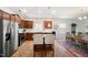 Modern kitchen with stainless steel appliances, granite countertops, and a breakfast bar at 4102 Catfish Way, Durham, NC 27703