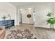 Warm living room with a view to a dining room, hardwood flooring, and stylish decor at 4102 Catfish Way, Durham, NC 27703