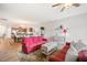 Inviting living room featuring comfortable sofas and an open layout that connects to the kitchen and dining area at 4102 Catfish Way, Durham, NC 27703