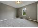 This bedroom offers comfort and tranquility at 414 Longfellow St, Fuquay Varina, NC 27526