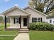 Charming single story home with a well manicured lawn and classic architectural details at 414 Longfellow St, Fuquay Varina, NC 27526