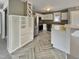 Eat in kitchen features white cabinetry and stainless steel appliances at 414 Longfellow St, Fuquay Varina, NC 27526