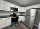 Well-equipped kitchen with modern appliances and sleek countertops at 427 Elm Ct, Burlington, NC 27215
