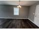 Inviting dining space with stylish flooring and contemporary lighting fixture at 427 Elm Ct, Burlington, NC 27215