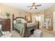 This bedroom features a spacious layout, a decorative bed frame, and a cozy sitting area at 45 Pebble Creek Dr, Franklinton, NC 27525