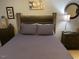 Cozy bedroom featuring a comfortable bed with a padded headboard and soft neutral bedding at 45 Pebble Creek Dr, Franklinton, NC 27525