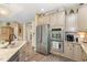 This kitchen boasts granite countertops, stainless steel appliances, double ovens, and ample cabinet space at 45 Pebble Creek Dr, Franklinton, NC 27525