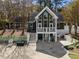 Modern home with expansive windows, multiple decks, and a unique elevated design at 4724 Worchester Pl, Raleigh, NC 27604