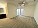 Spacious bedroom with plush carpeting, neutral walls, and a ceiling fan at 4907 Hollenden Dr # 105, Raleigh, NC 27616