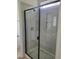Modern bathroom with glass enclosed shower and beautiful tile at 5710 Russell Rd, Durham, NC 27712