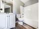 Cozy bathroom features a tiled shower/tub and vanity with plenty of storage space at 5908 O C Hester Rd, Holly Springs, NC 27540