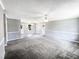 Expansive living area showcasing great natural light and open floor plan at 5908 O C Hester Rd, Holly Springs, NC 27540