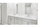 Bathroom featuring dual sinks and framed mirrors at 601 White Birch Ln, Angier, NC 27501
