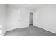 This bedroom features neutral walls, carpet and includes a closet for storage at 601 White Birch Ln, Angier, NC 27501