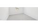 Bright bedroom featuring neutral carpet and a window for natural light at 601 White Birch Ln, Angier, NC 27501