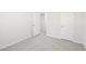 Bedroom with closet and open door to other rooms in the house at 601 White Birch Ln, Angier, NC 27501