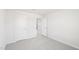 A bedroom with carpet, a closet, and a door open to the hallway at 601 White Birch Ln, Angier, NC 27501