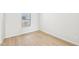 Bedroom featuring hardwood floors, natural light, and white paint at 601 White Birch Ln, Angier, NC 27501