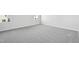 Spacious bedroom featuring carpet floors and two sunny windows at 601 White Birch Ln, Angier, NC 27501