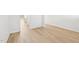 Hardwood floors can be seen throughout the open floor plan of this new construction home at 601 White Birch Ln, Angier, NC 27501