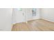 Living room featuring hardwood floors, natural light, and white paint at 601 White Birch Ln, Angier, NC 27501
