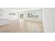 Open living area with hardwood floors, a sliding glass door and large windows for natural light at 601 White Birch Ln, Angier, NC 27501