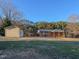A home with a detached garage and expansive yard at 604 Orange Factory Road, Bahama, NC 27503