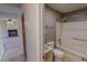 Compact bathroom with a sink, toilet, and a shower-tub combo at 604 Orange Factory Road, Bahama, NC 27503