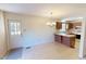 Bright kitchen featuring a dining area, modern appliances, and a door that leads outside at 604 Orange Factory Road, Bahama, NC 27503