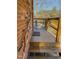 Outdoor porch featuring a wooden railing and staircase at 604 Orange Factory Road, Bahama, NC 27503