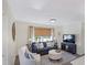 Comfortable living room with a plush sofa, armchair, ottoman and a TV at 61 Atherton Circle, Angier, NC 27501