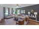 Cozy living room with stylish decor, wood floors, and ample natural light at 61 Atherton Circle, Angier, NC 27501