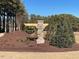 Stone community sign for Cambridge Preserve surrounded by trees and landscaping at 62 Atherton Circle, Angier, NC 27501