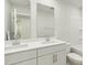 Bathroom featuring double sink vanity with white cabinets, toilet, and shower/tub combination at 621 White Birch Ln, Angier, NC 27501