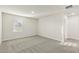 Neutral carpeted bedroom with window and light walls at 621 White Birch Ln, Angier, NC 27501
