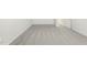 Bedroom featuring gray carpet, neutral walls, and a door leading to another room at 621 White Birch Ln, Angier, NC 27501