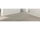 Light, carpeted living area with a staircase at 621 White Birch Ln, Angier, NC 27501