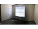 Neutral bedroom with a window for natural light and gray carpet flooring at 70 Ariel St, Lillington, NC 27546
