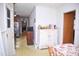 Hallway with decorative flooring, wooden cabinets, and a view through the home at 711 Evergreen Rd, Rocky Mount, NC 27803