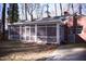 Screened-in porch of a brick house at 711 Evergreen Rd, Rocky Mount, NC 27803