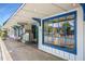 Bright storefront with blue trim, inviting customers to explore the shop at 766 Old Station Pointe, Angier, NC 27501